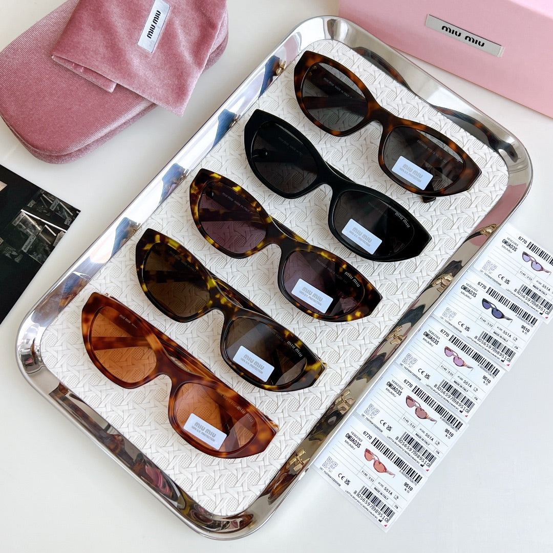 Miumiu Sunglasses 679437