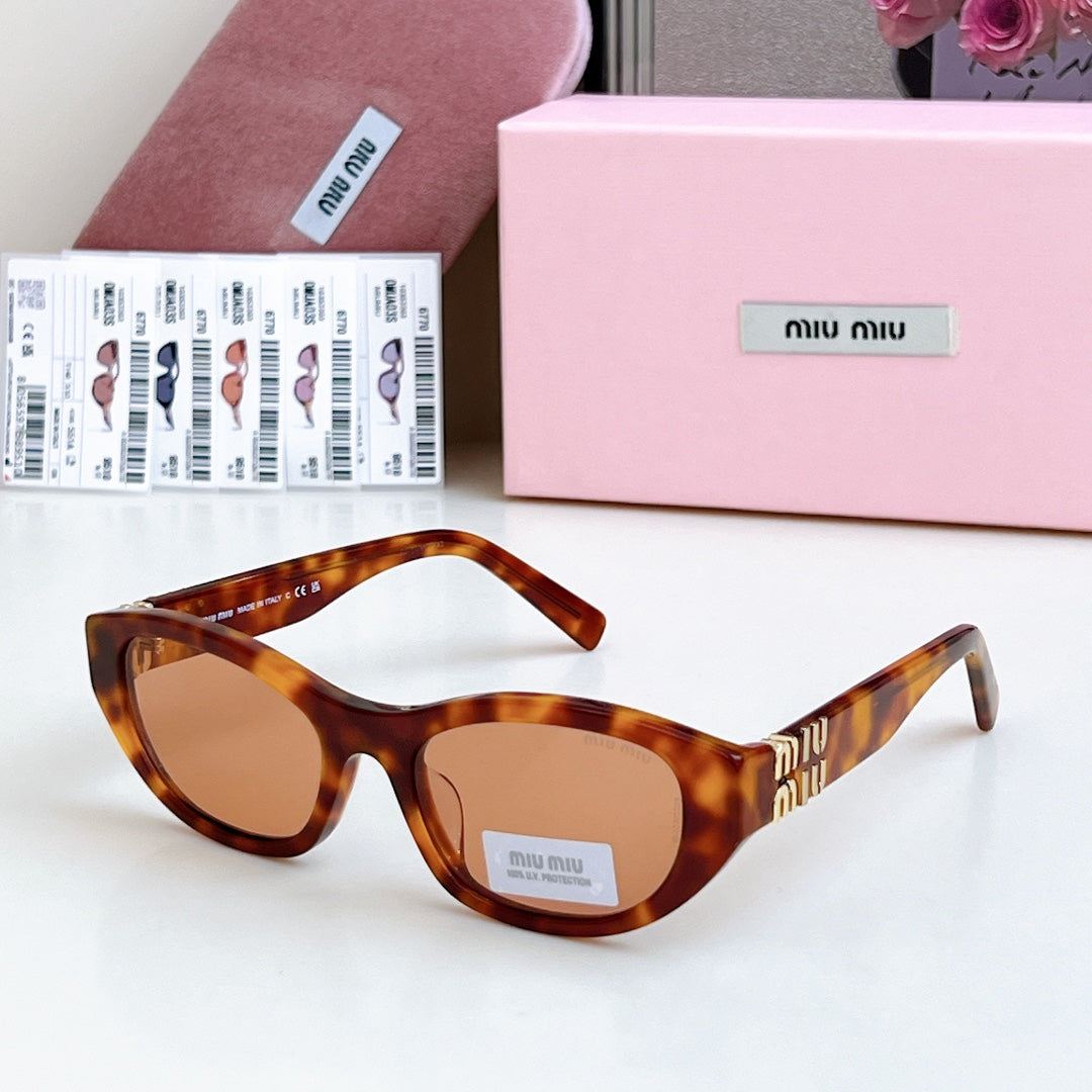 Miumiu Sunglasses 679437