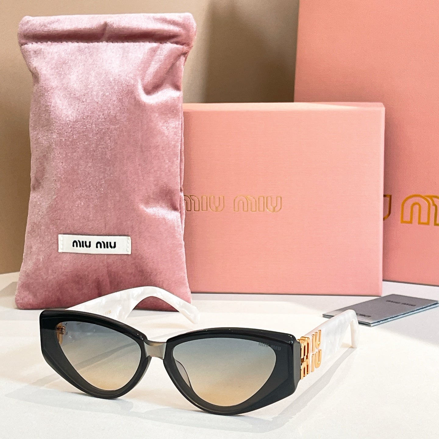 Miumiu Sunglasses 679514