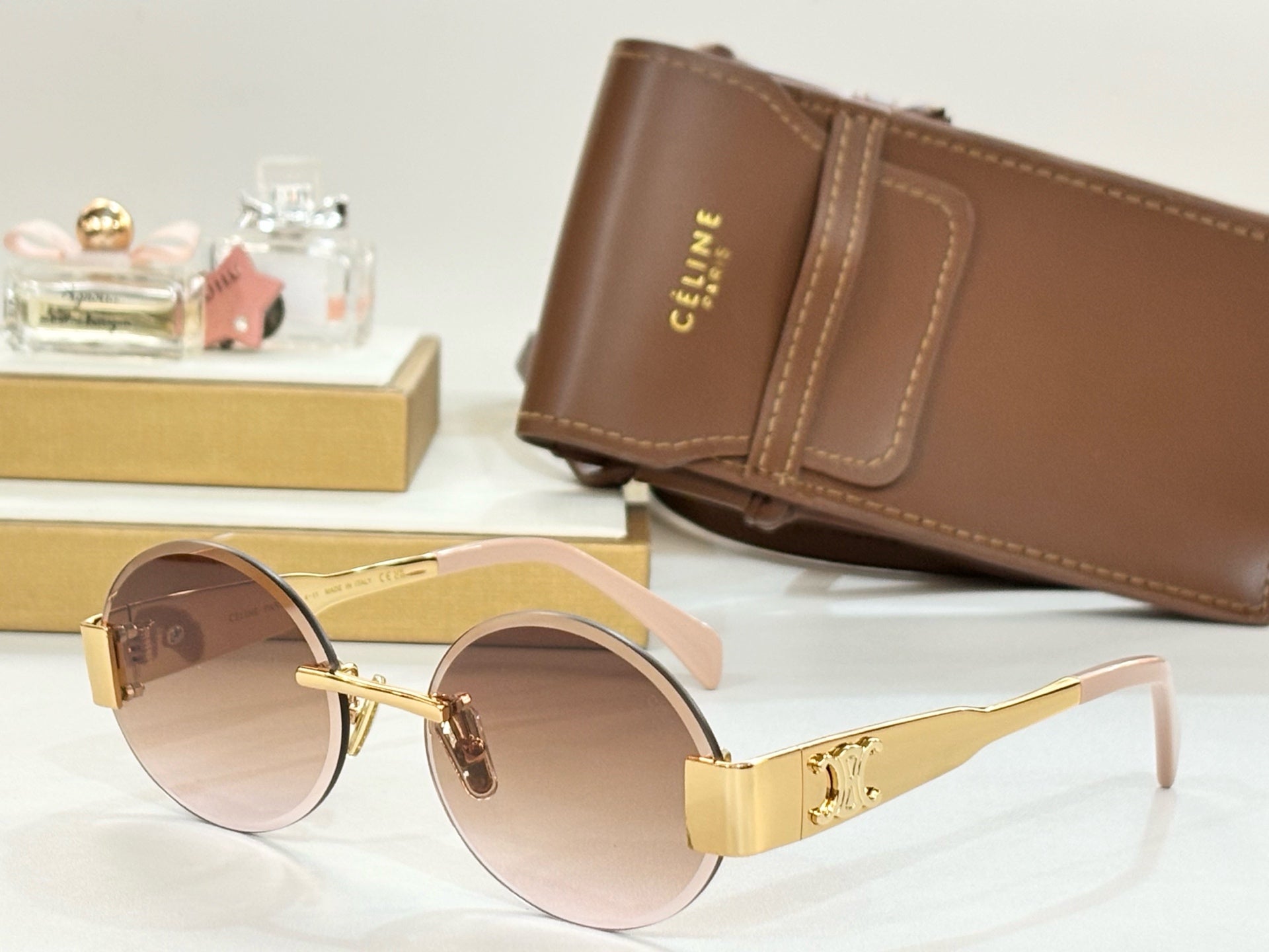 TRIOMPHE SUNGLASS CL42121U IN METAL