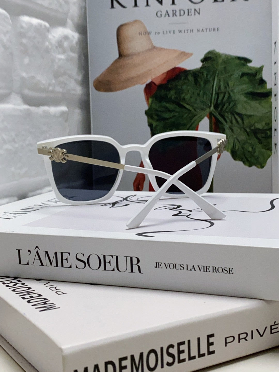 TRIOMPHE SUNGLASS 497817 IN WHITE METAL BLACK LENSES