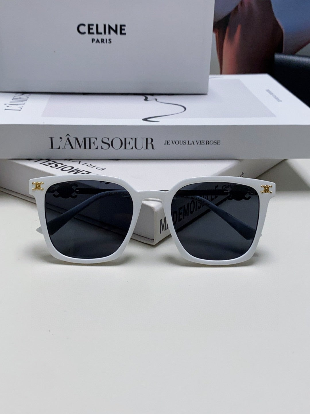 TRIOMPHE SUNGLASS 497817 IN WHITE METAL BLACK LENSES