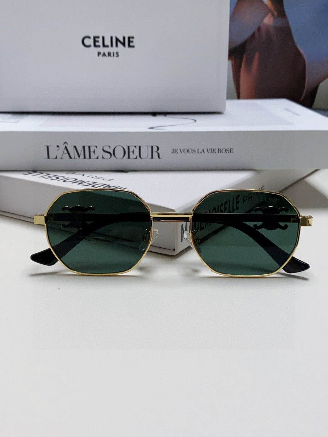 TRIOMPHE SUNGLASS 497821 IN GOLD METAL DARK TEAL LENSES