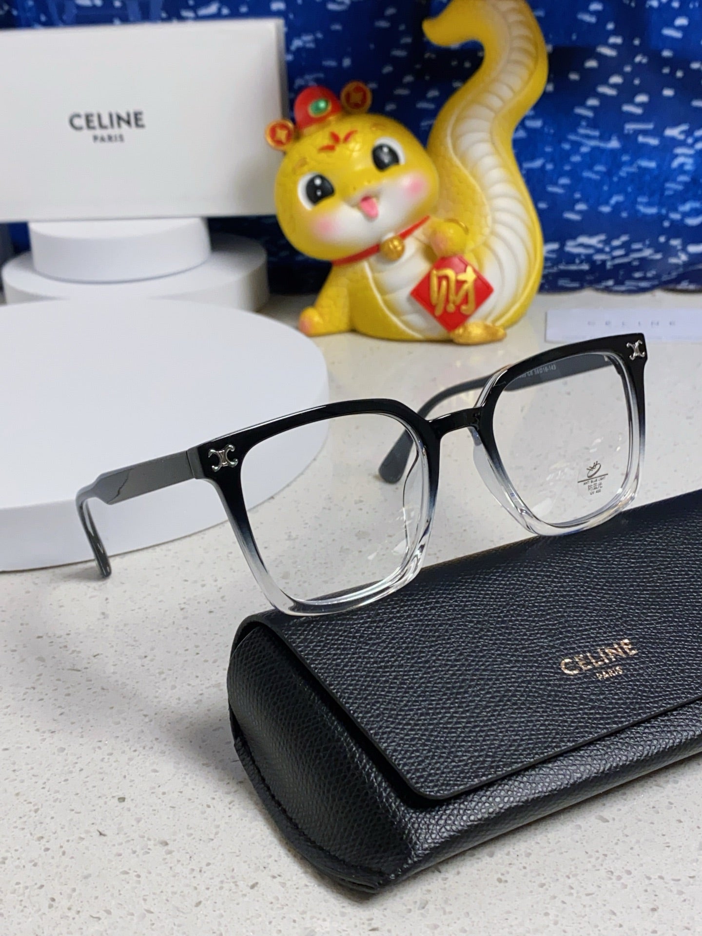 TRIOMPHE SUNGLASSES 563255 IN BLACK TO CLEAR ACETATE