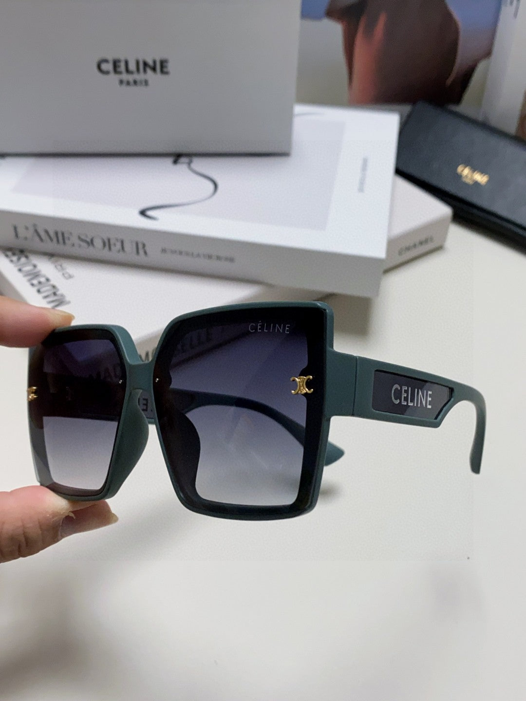 TRIOMPHE SUNGLASSES 573253 IN BABY BLUE ACETATE