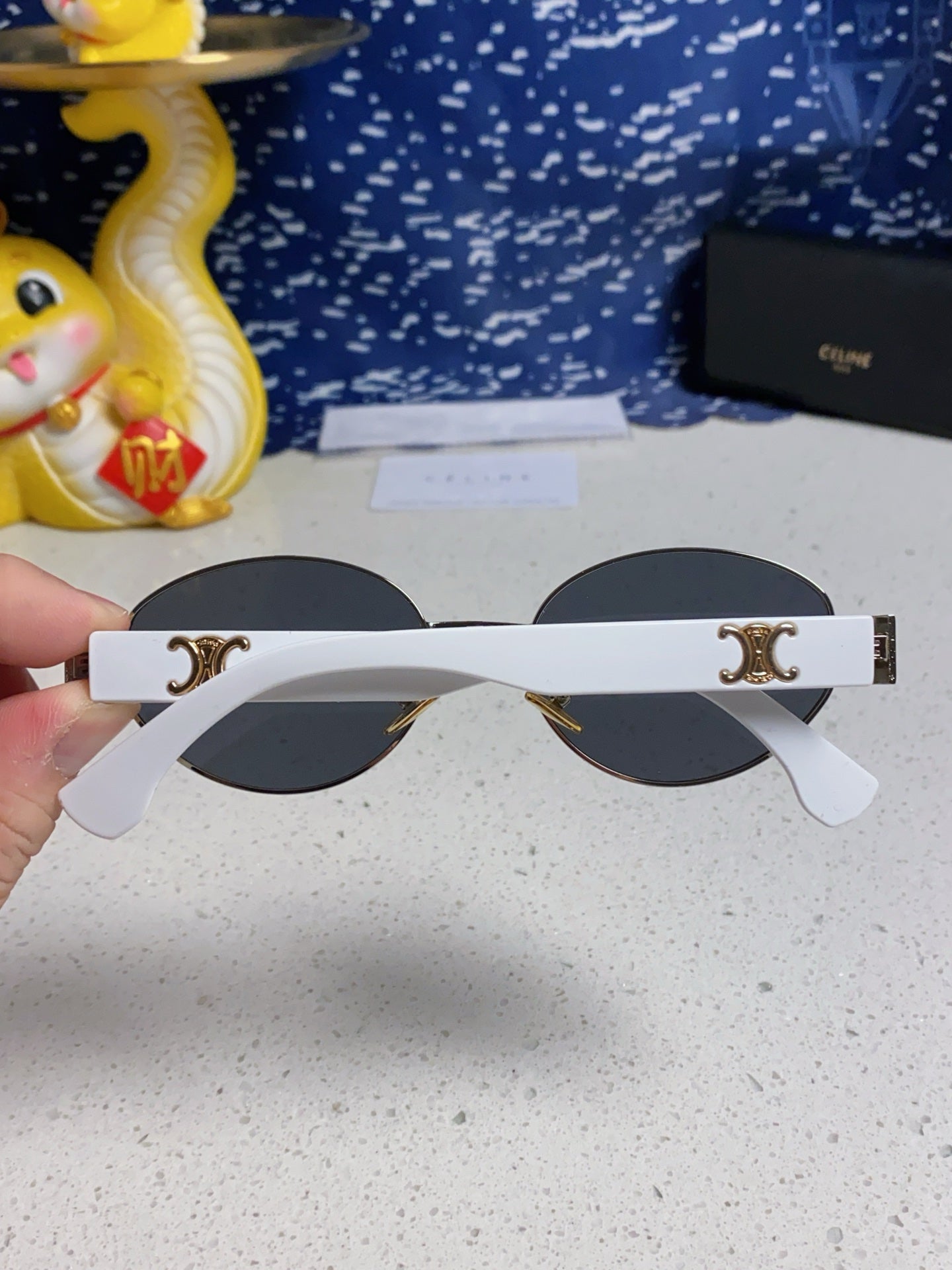 TRIOMPHE SUNGLASS 538530 IN WHITE ACETATE BLACK LENSES