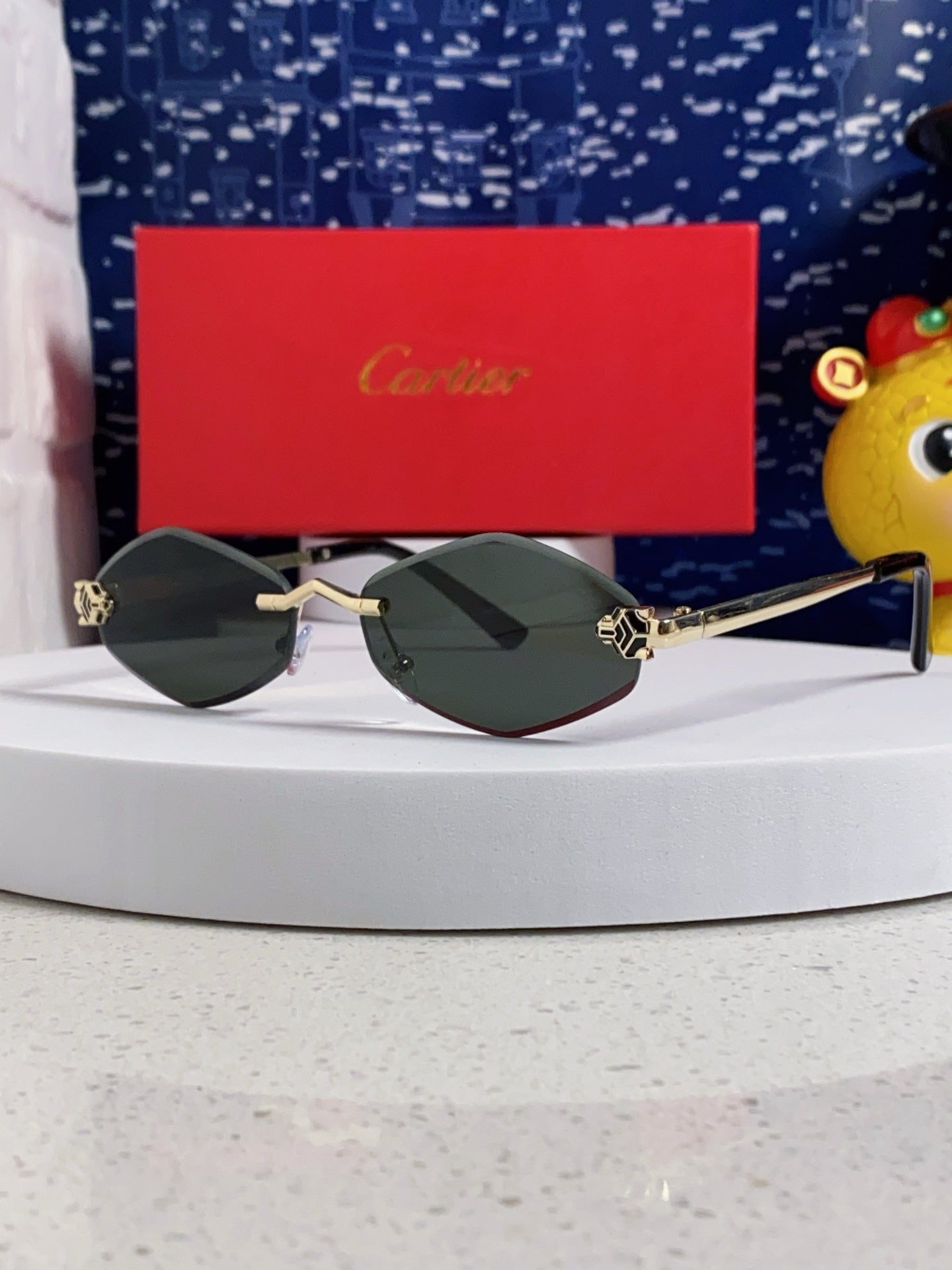 PANTHÈRE RIMLESS RHOMBUS FRAME SUNGLASSES CT0443S IN METAL