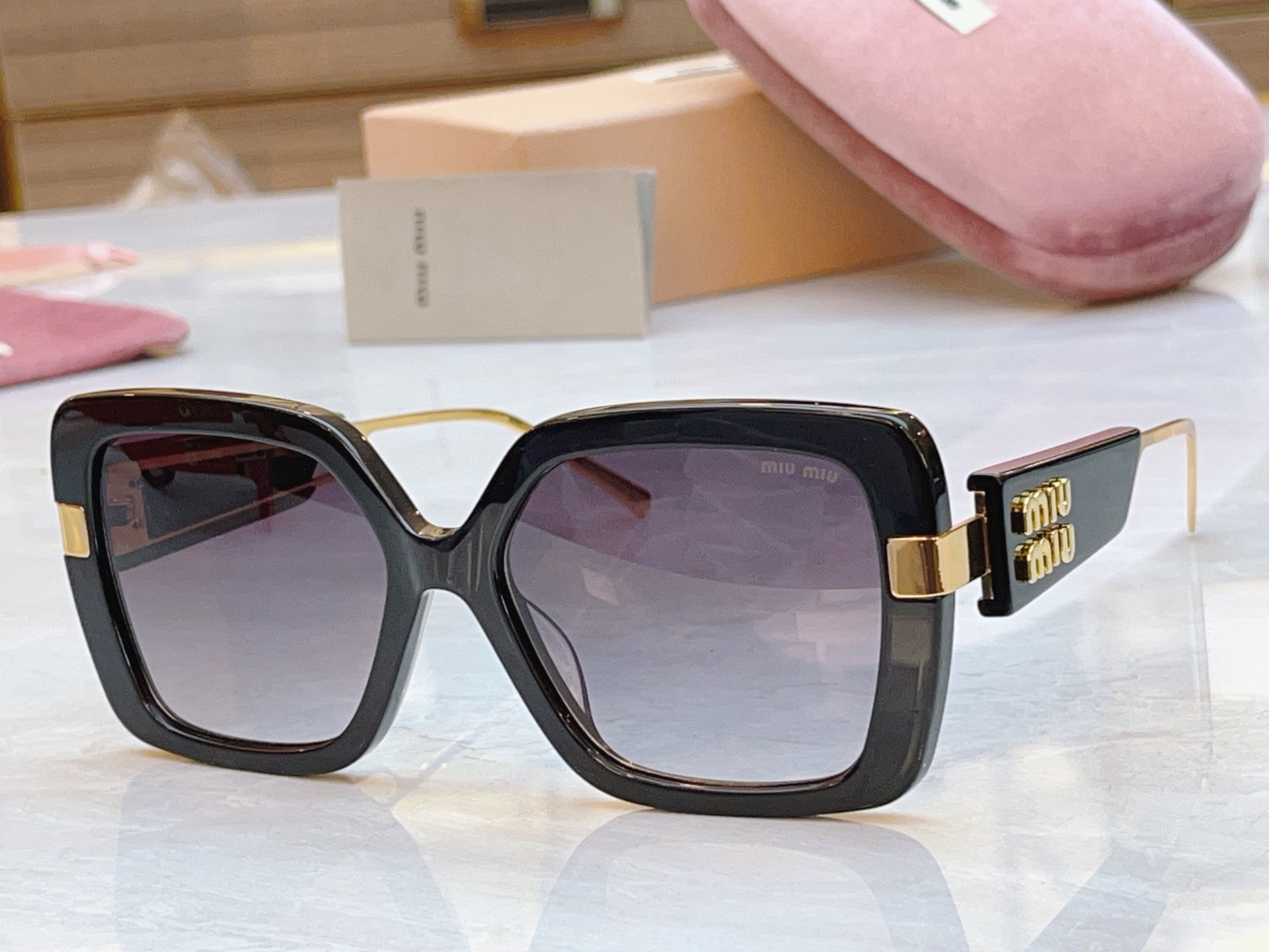 Miumiu Sunglasses 692553