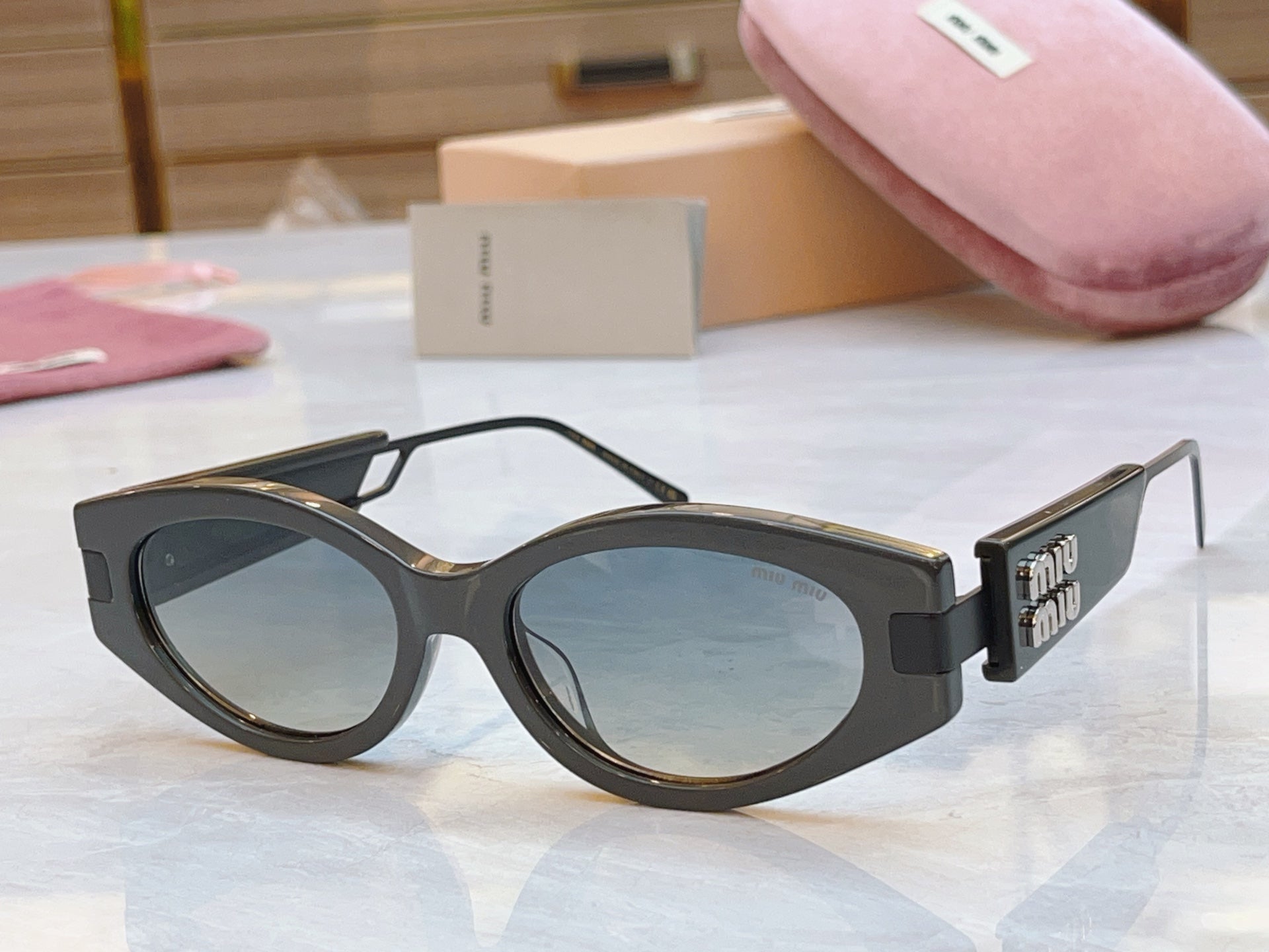 Miumiu Sunglasses 692554