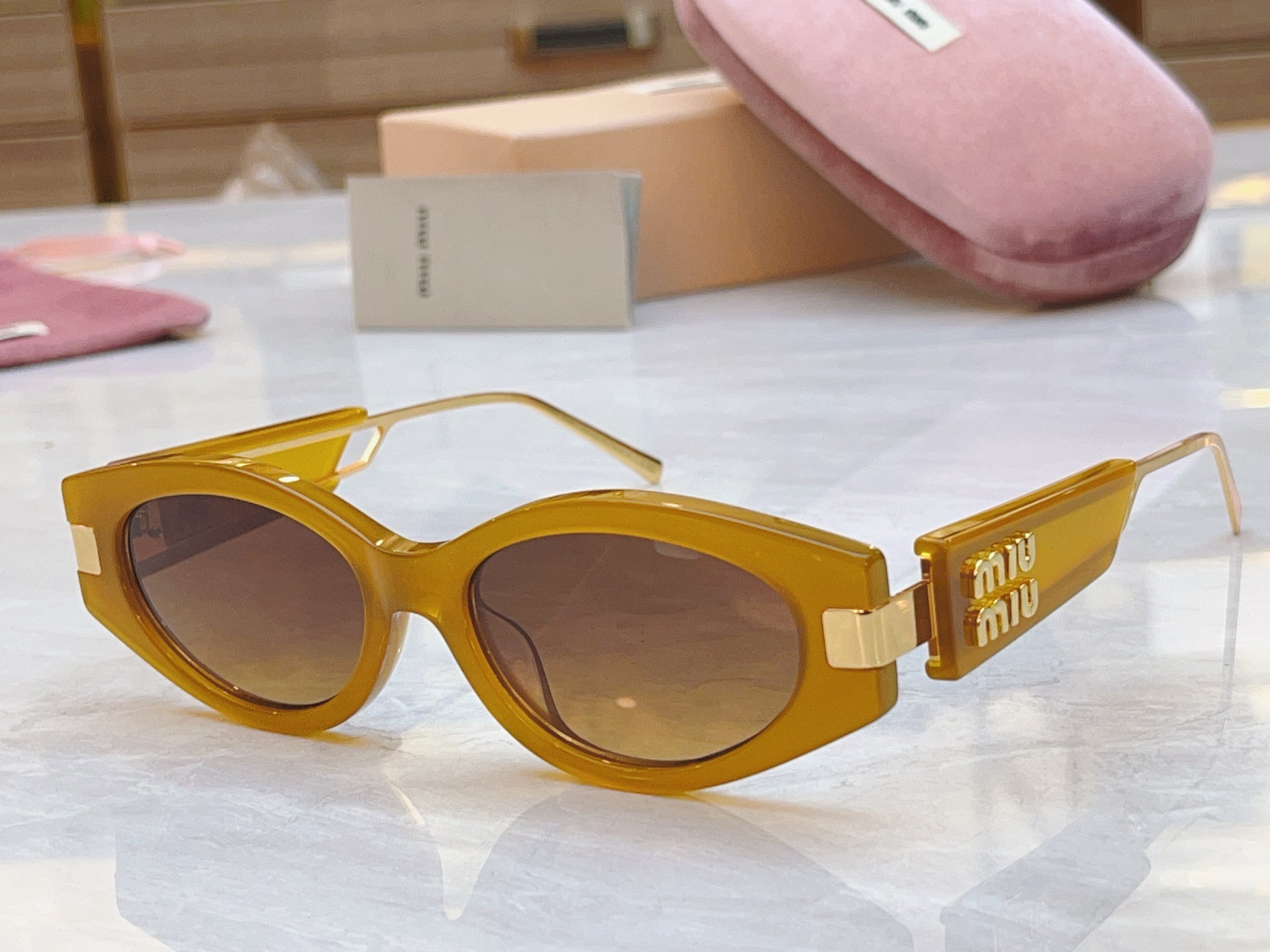 Miumiu Sunglasses 692554