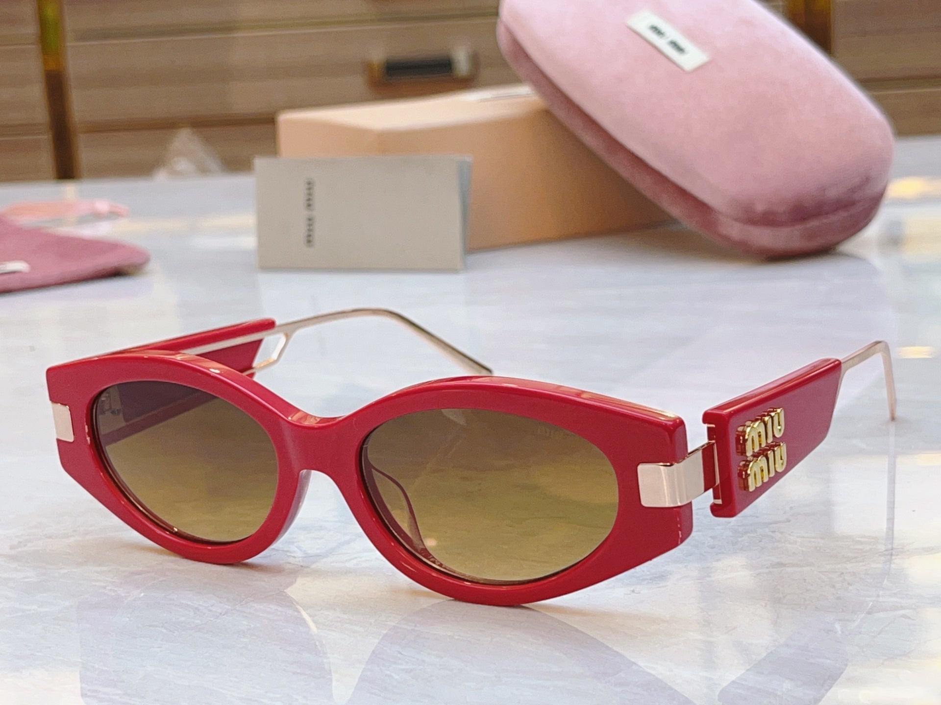 Miumiu Sunglasses 692554