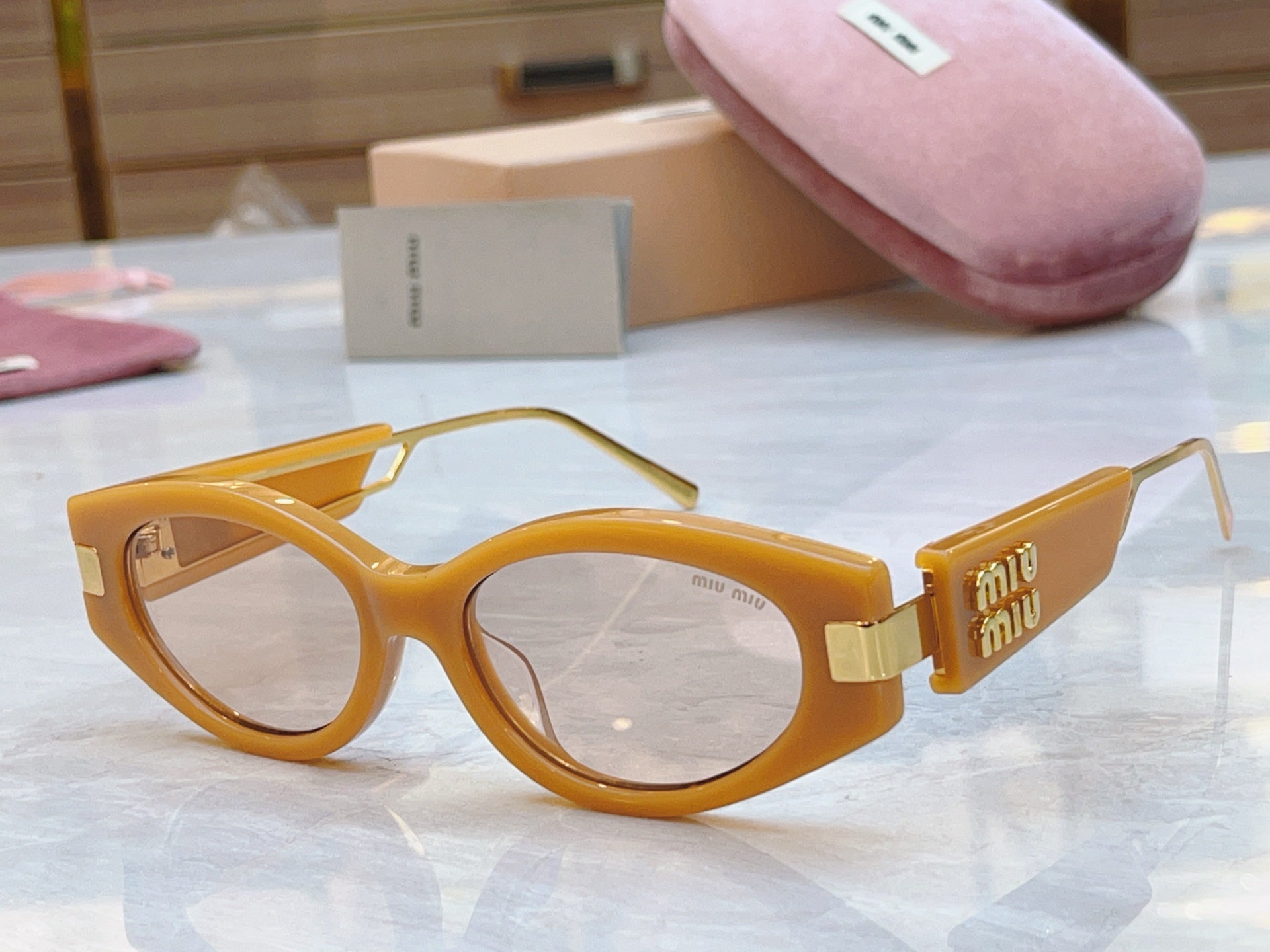 Miumiu Sunglasses 692554